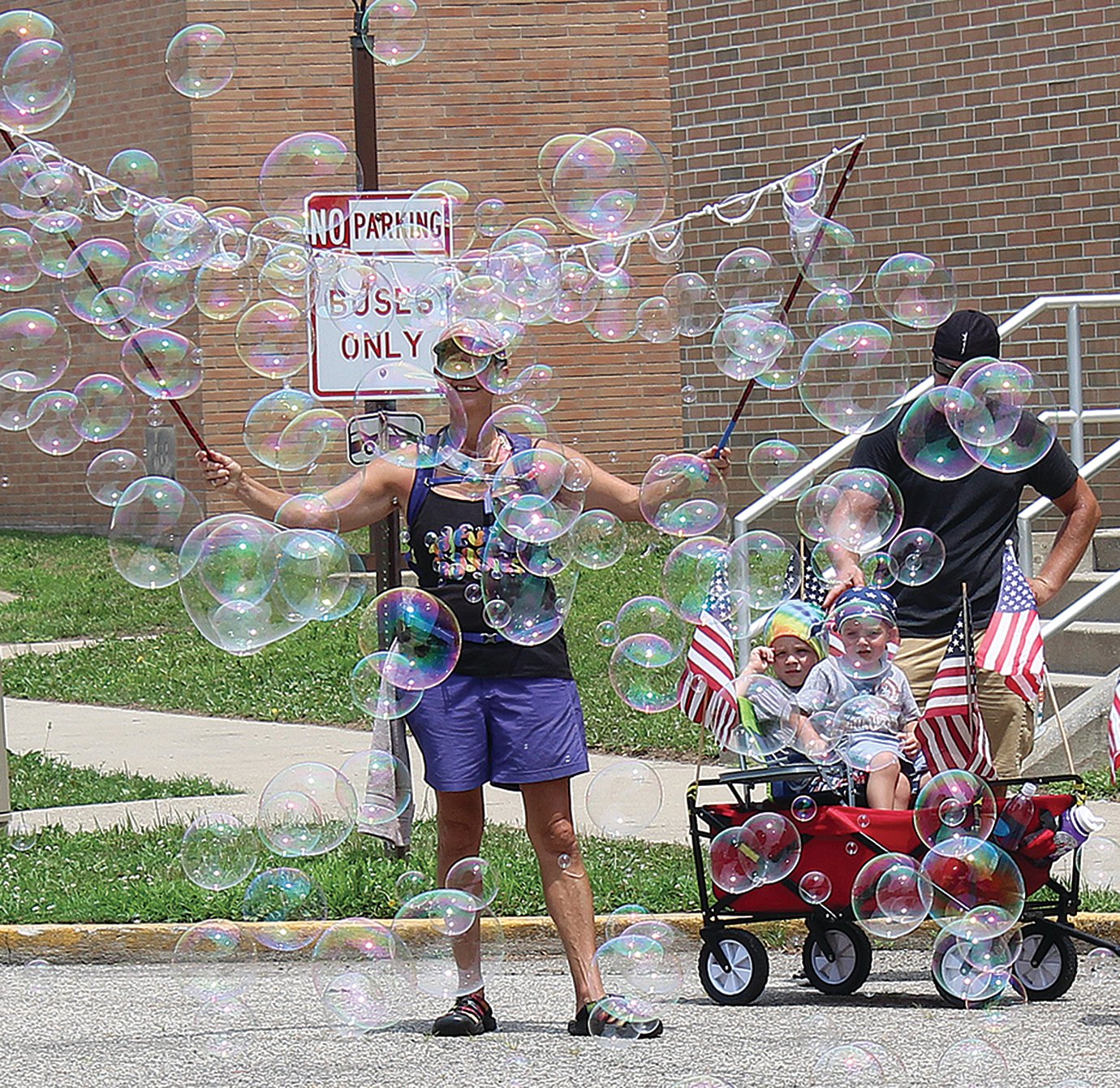 Bubbles, bubbles ... everywhere as parade entries line up Saturday for the Covington Fourth of July parade.